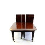 An early Victorian mahogany extending dining table