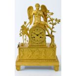 A French Empire style gilt bronze figural mantel clock