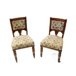 A set of six Victorian oak dining chairs