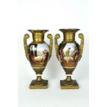 A pair of French porcelain twin handled vases