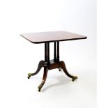 A plum pudding mahogany and simulated rosewood table