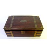 A mahogany and brass bound campaign desk