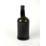 An Oxford University sealed wine cylinder wine bottle