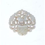 A Chinese pale green jade openwork plaque