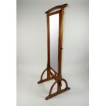 A modern walnut framed cheval mirror