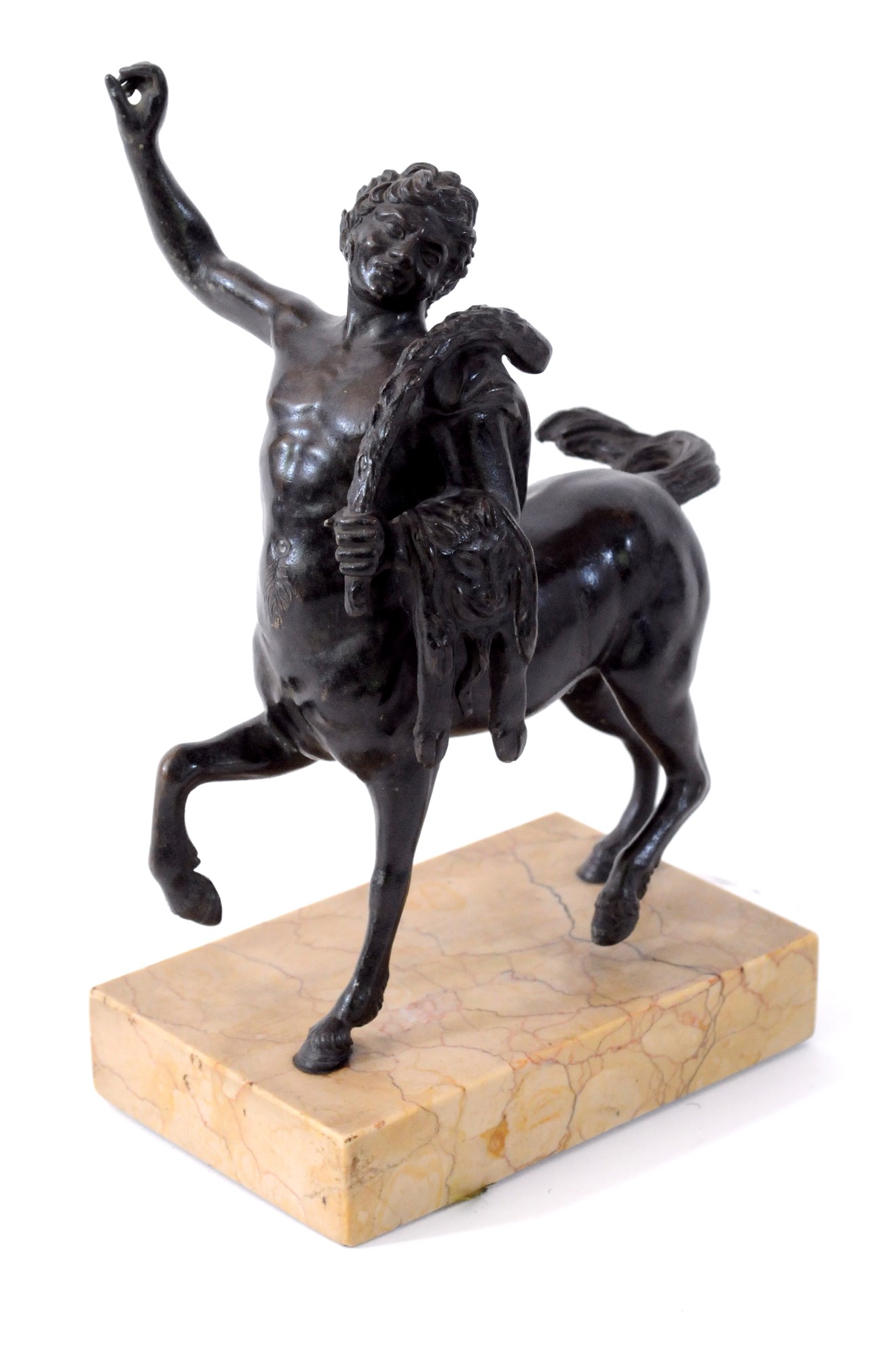 A patinated bronze study of a young centaur