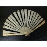 A Canton carved ivory brise fan