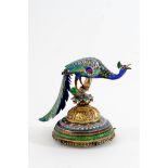 An Indian parcel gilt and silver enamelled peacock