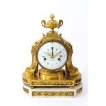 A Louis XVI gilt bronze mantel clock