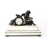 A French bronze and white marble mantel clock by F.L. Hausburg, Paris