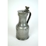 An 18th century French pewter ale pitcher