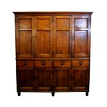 A Regency oak and ebony strung house keeper’s cupboard