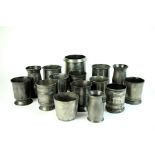 A large collection of 15 assorted pewter measures