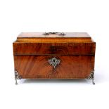 A mahogany tea caddy