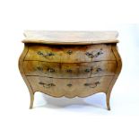 An Italian walnut and boxwood inlaid bombe commode