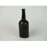 A late 18th century sealed wine bottle