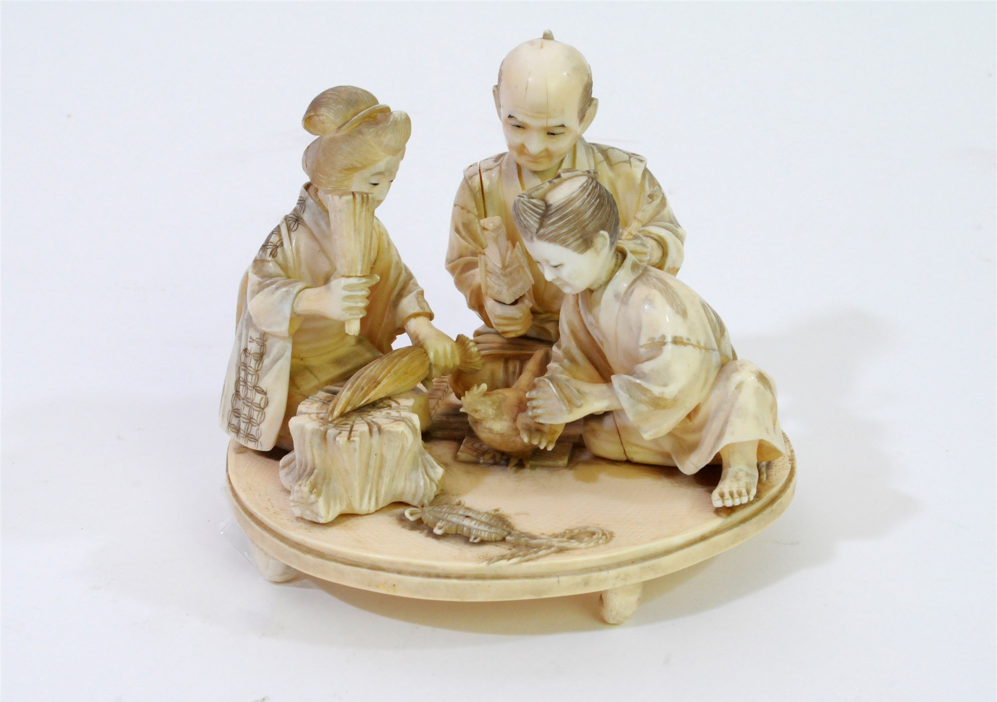 Gyokuzan: A Japanese carved ivory family group