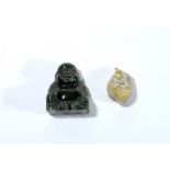 A Chinese deep green nephrite figure of Hotei