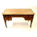A Victorian oak desk, mid 19th century