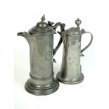 A late 19th century/early 20th century pewter communion flagon