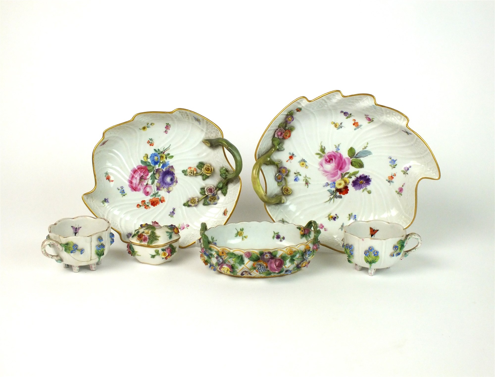 A pair of Meissen leaf dishes