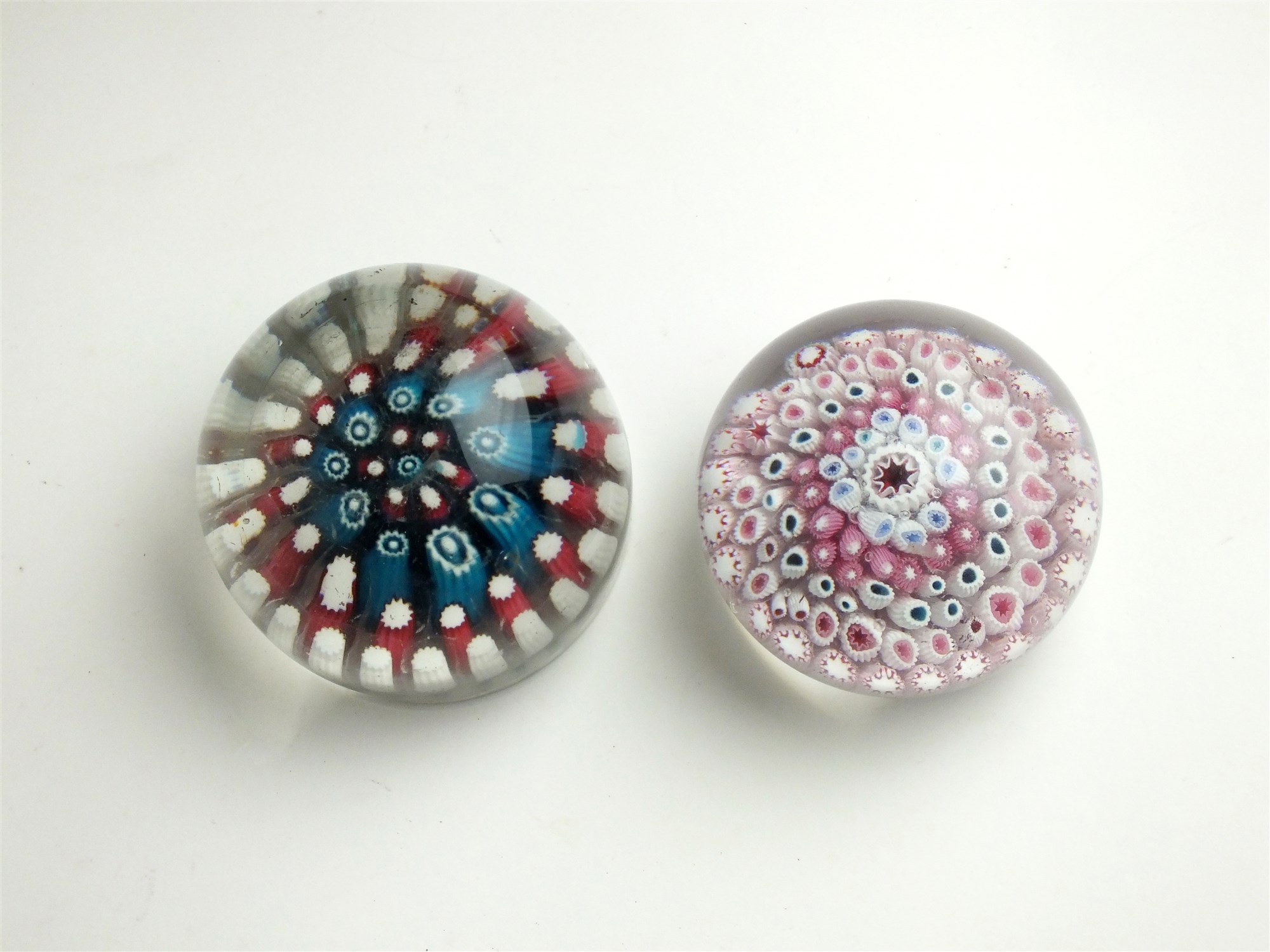 Two English glass paperweights by HG Richardson