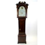 A George III oak and mahogany cross banded longcase clock.