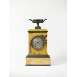 A French neoclassical Sienna marble and bronze mantel clock