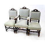 A set of six (4+2) Victorian oak panel back dining chairs