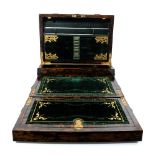 A Victorian gothic coromandel and gilt metal mounted writing box
