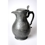 A Continental 18th century pewter flagon