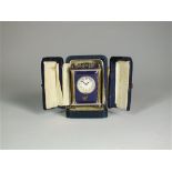 A cased miniature carriage timepiece