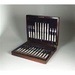A cased set of silver fruit knives and forks