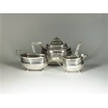 A three piece silver tea service