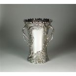 A large two handled silver vase