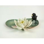 A Royal Worcester model of a Moorhen Chick and a Water Lily