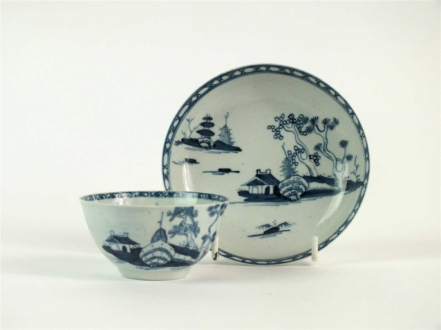 A Richard Chaffers, Liverpool 'Cannonball' tea bowl and saucer