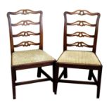 Seven 19th century mahogany ladder back dining chairs