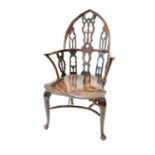 An unusual 18th century vernacular gothic Windsor armchair