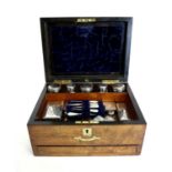 A Victorian walnut cased travelling vanity box