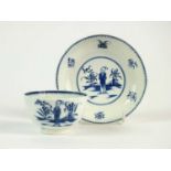 A Caughley 'Waiting Chinaman' tea bowl and saucer