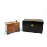 A Victorian coromandel veneered tea caddy and an early 20th century cigarette dispenser