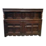 A large 17th century and later country oak court cupboard