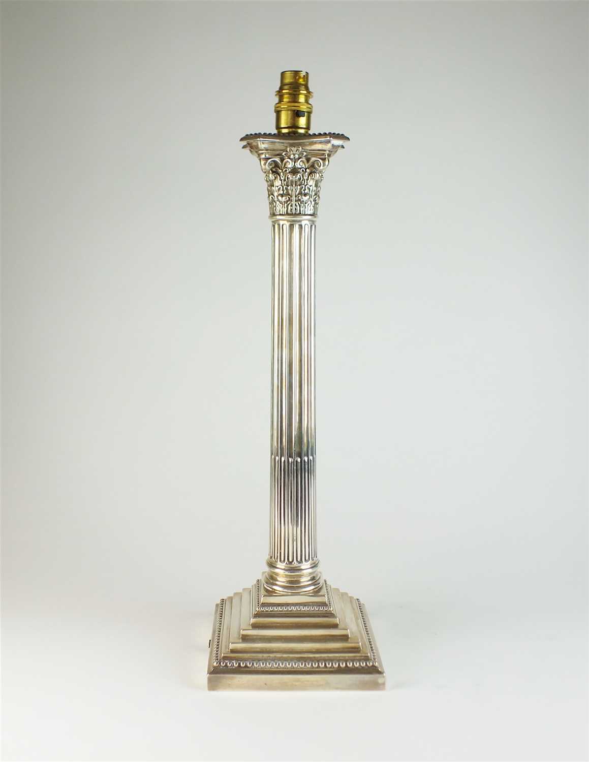 A silver mounted lamp base