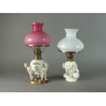 Two Victorian porcelain oil lamps