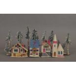 A group of 20th century Czechoslovakian-made (sic) model houses and lead models of trees