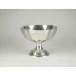A silver pedestal presentation cup