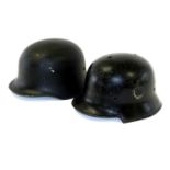 † A post-war German civic M34 style steel Fire Service helmet