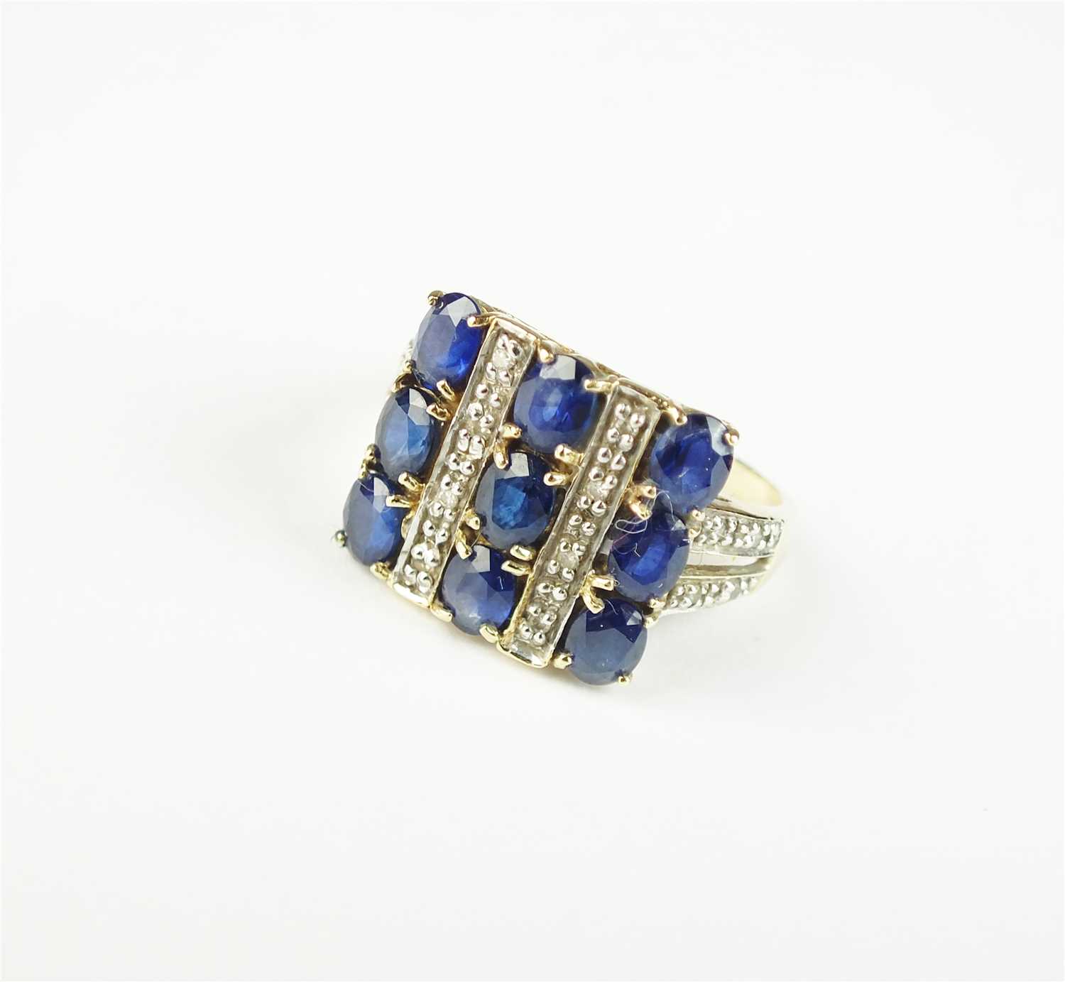 A sapphire and diamond dress ring