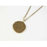 A 9ct gold plain polished circular locket pendant